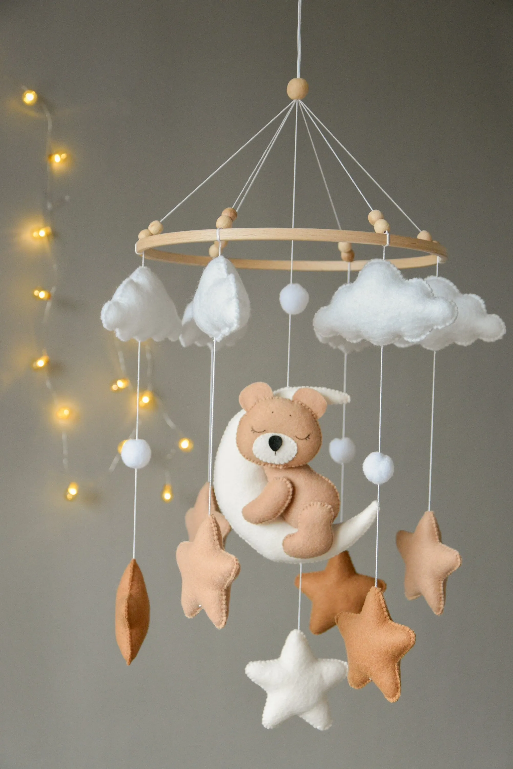 Baby mobile with sleeping bear, moon, stars and clouds