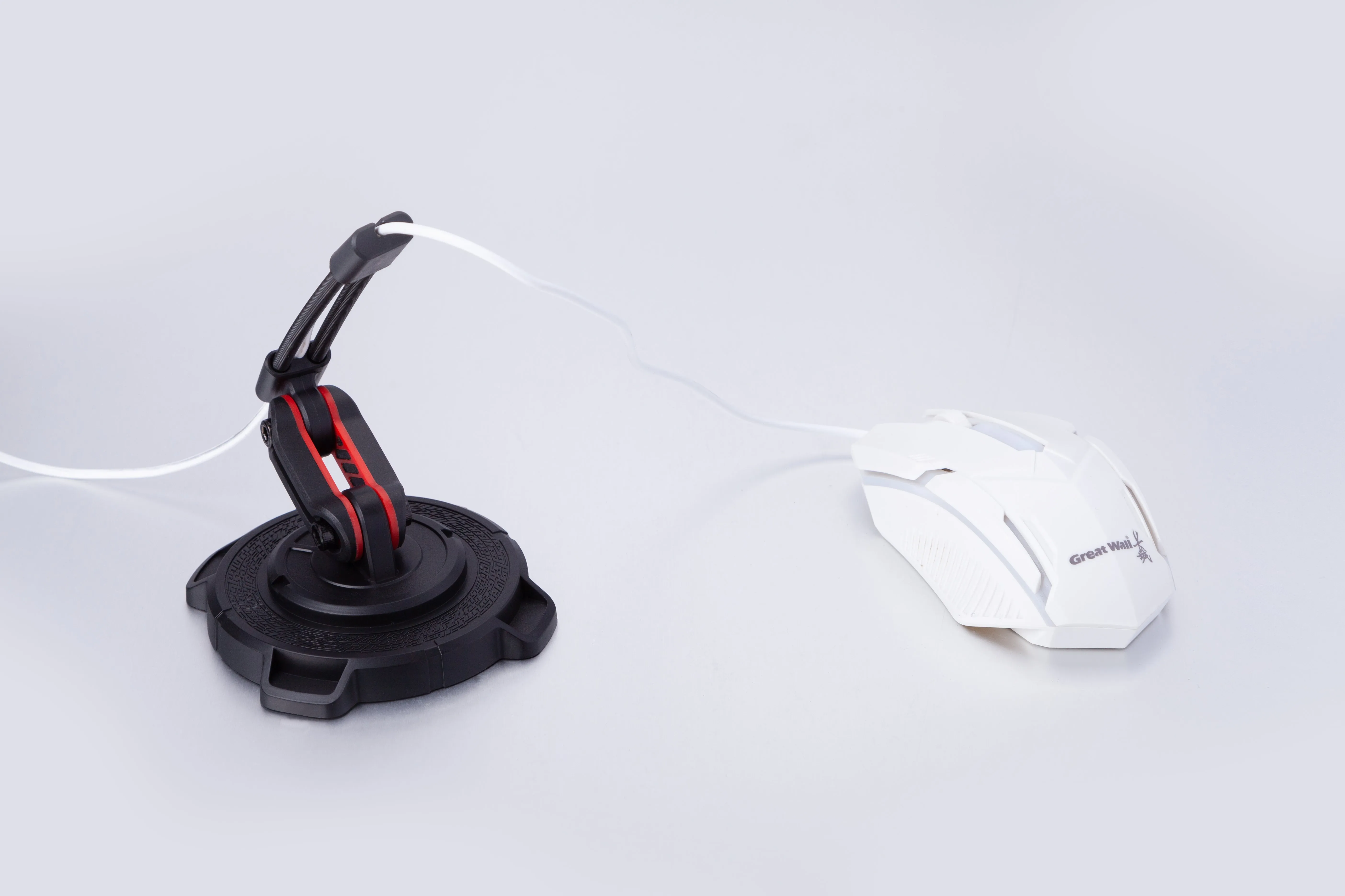 Lunar Dial Mouse cable management device